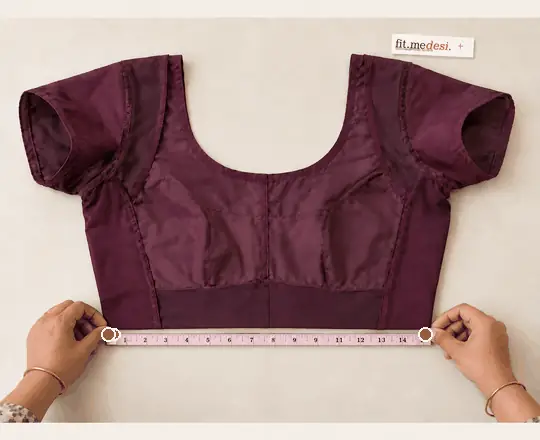 Inside-out Indian blouse with a measurement line showing waist